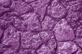 Wall made of old stones in purple tone Royalty Free Stock Photo