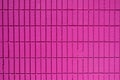 Wall made of rectangular pink mosaic tiles Royalty Free Stock Photo