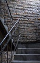 Old grunge brick wall background with stairs