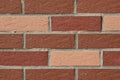 Wall made of red and pink bricks Royalty Free Stock Photo