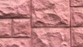 The wall is made up of pink bricks. Royalty Free Stock Photo