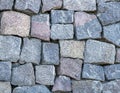 Wall masonry from chipped granite blocks. Wall stone pattern Royalty Free Stock Photo