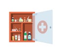 Red medical cabinet with open and closed glass transparent door. Medicine chest Royalty Free Stock Photo