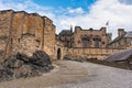 Wall and medieval buildings with stone church in Edinburgh Castle, Scotland, UK. Royalty Free Stock Photo