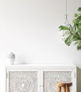 Wall mockup close up in Coastal living room interior with commode, plant and decor