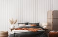 Wall mockup in coastal bright bedroom, rattan furniture and orange bedding in trendy decoration
