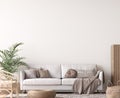 Wall mockup in living room design, White sofa in Scandinavian interior Royalty Free Stock Photo