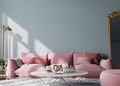 Wall mockup in modern living room design, pink sofa and white flower vase and gold home accessories on empty interior background