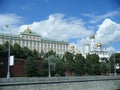 The wall of the Moscow Kremlin, the government building and the temple of Christ the Savior.