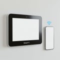 Wall-mounted digital device labeled \