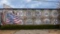 Wall mural on a Dallas business decorated with patriotic symbols.
