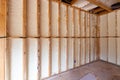 Wall in new home under construction, with spray foam insulation Royalty Free Stock Photo