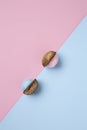 Wall nuts with pom pom on dual tone background