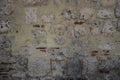 Wall from an old block made of shell rock and red brick background