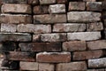 Wall of old bricks. Texture. A pile of building bricks Royalty Free Stock Photo