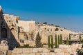 Wall of Old City of Jerusalem with background of Jewish graveyard at the Mount of Olives near the Kidron Valley or King`s Valley Royalty Free Stock Photo