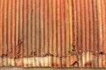 Detail: Rust Patterns and Crumbling Metal on the Side of an old Quonset Hut Royalty Free Stock Photo