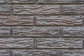 Wall of old red bricks with a pattern.