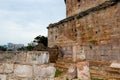 The wall of the old tower. The brick collapsed the fence. Antalya, Turkey, April 6, 2019