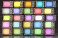 Wall of old TVs with different colors screen Royalty Free Stock Photo