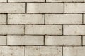 Wall of an old uneven brown brick. background Royalty Free Stock Photo