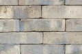 Wall of an old uneven brown brick. background Royalty Free Stock Photo