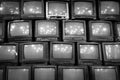 Wall of old vintage tube televisions background