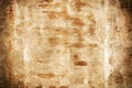 Wall with orange and brown stripes. A beautiful texture of plaster and paint, with rusty stains. An unusual background Royalty Free Stock Photo