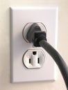 Wall Outlet - Black Plug Royalty Free Stock Photo