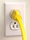 Wall Outlet - Yellow Plug Royalty Free Stock Photo
