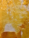 Wall painted in chipped yellow