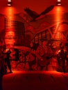 Wall painting of Jakarta covered in red ligth