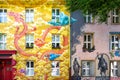 Graffiti, urban art in the city, abstract fantasy painting with dragon and Virgin Mary on house fronts in Dusseldorf, Germany