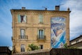 Wall paintings - trompe l`oeil - on outisde of ornate building in Carcassonne, Aude, France