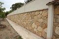 Wall partially lined with natural stone Royalty Free Stock Photo