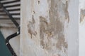 Wall with peeling paint and visible damage in a building Royalty Free Stock Photo