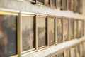 Wall with picture in wooden frames. Classic decoration gallery.