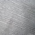 Grey fluted plaster background.The wall is plastered in gray stripes.