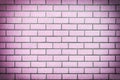 Wall of purple bricks. The texture of the brickwork. Royalty Free Stock Photo