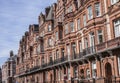 A wall of redbricked houses in London. Royalty Free Stock Photo