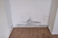 Wall after removal of the mould, close-up cleaned plaster on the wall Royalty Free Stock Photo