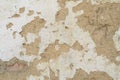 The wall of a residential old house built with bricks made from mud, cow dung and straw. Peeling plaster. Serbia Royalty Free Stock Photo