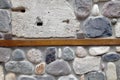 Wall of rocks and stones in cement. Royalty Free Stock Photo