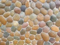 Wall round stone rock texture and seamless background Royalty Free Stock Photo