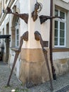 Wall sculpture on a corner in town of Jelenia Gora in Poland