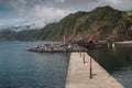 Port and mountains in Povoacao, Sao Miguel, Azores