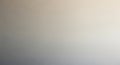 Smooth gradient background transitioning from light beige to soft gray with subtle texture and soft lighting Royalty Free Stock Photo