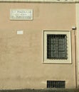 Wall and sign in a street of Trastevere, Rome