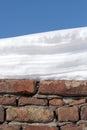 Wall, snow and sky