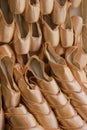 A Wall of Stacked Pink Satin Ballet Slippers